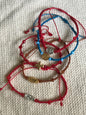 Thread Bracelet with Medal and Beads